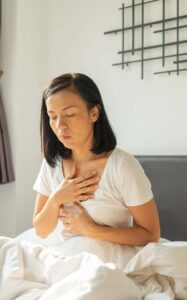 Young Pregnant Woman With Heartburn