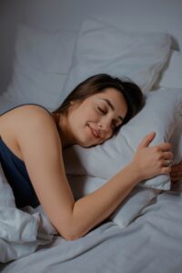 Woman asleep in bed