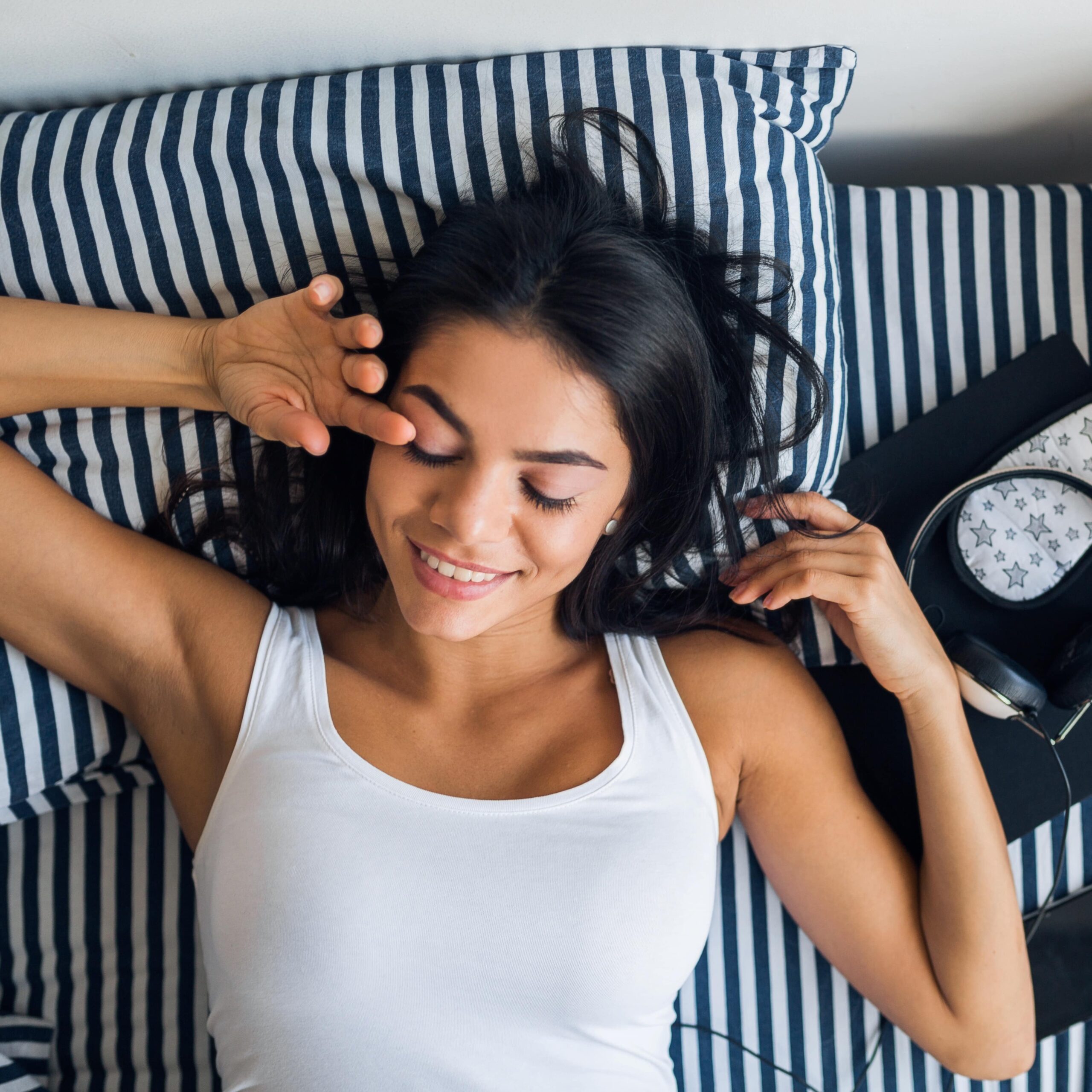 Woman waking up in bed