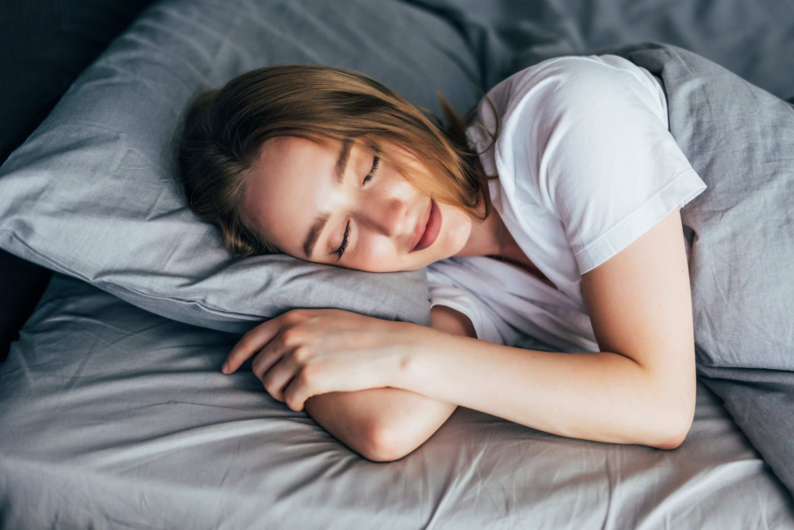 Woman sleeping in bed